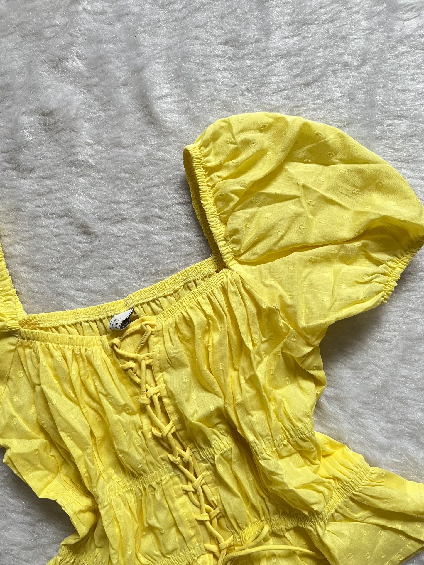 Yellow puffed sleeve top
