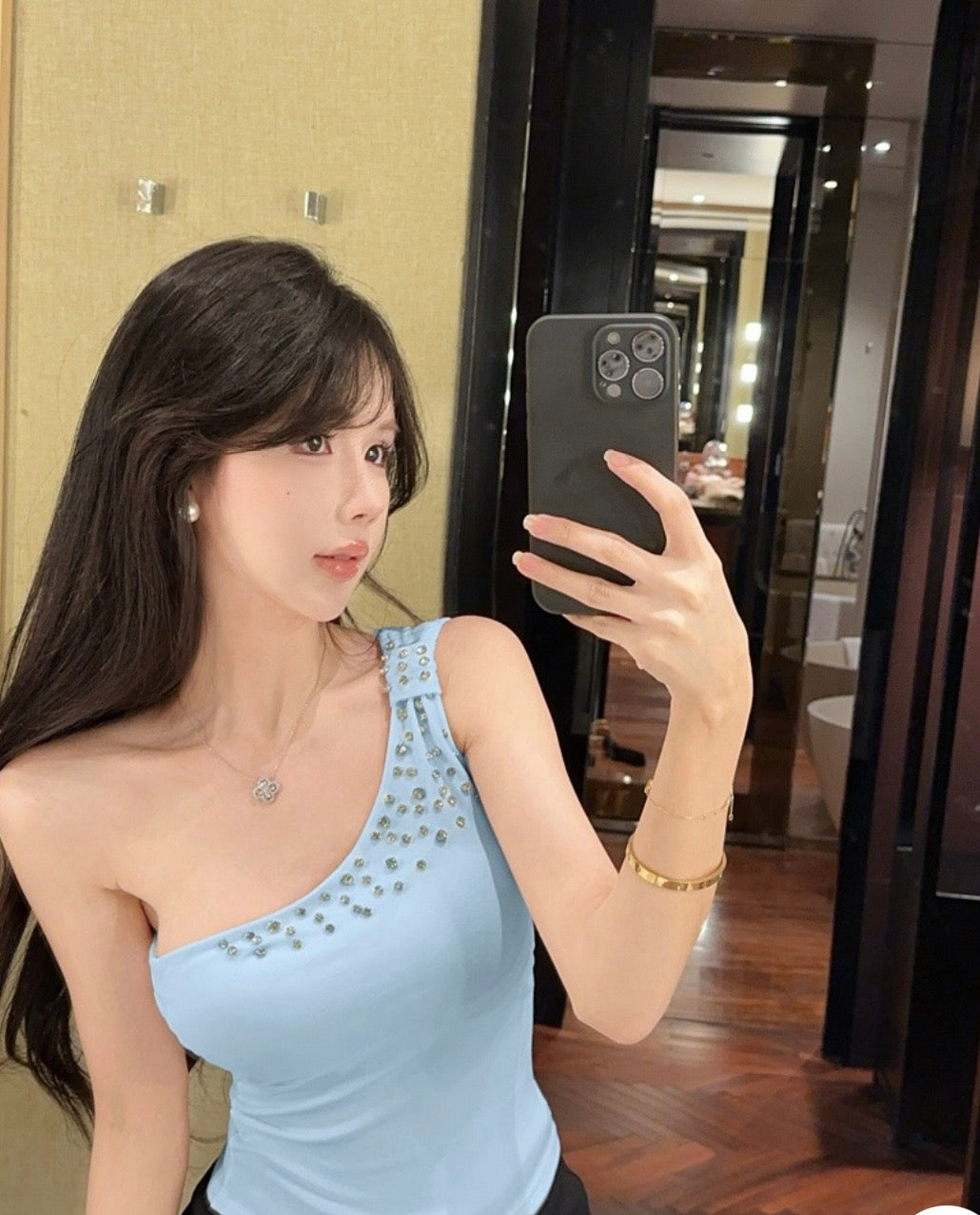 One shoulder studded tops