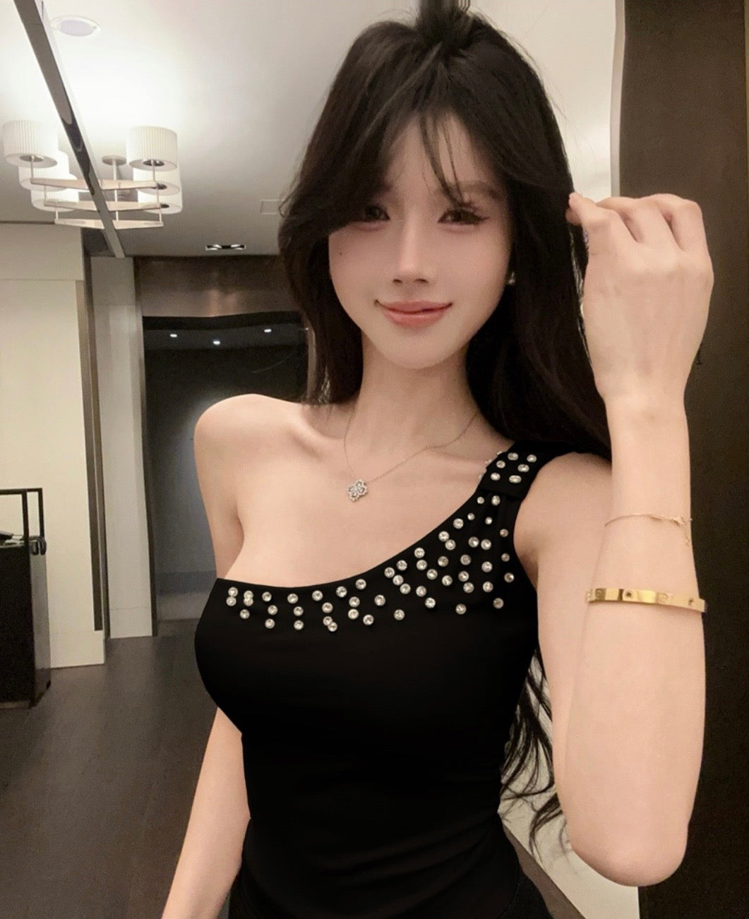 One shoulder studded tops