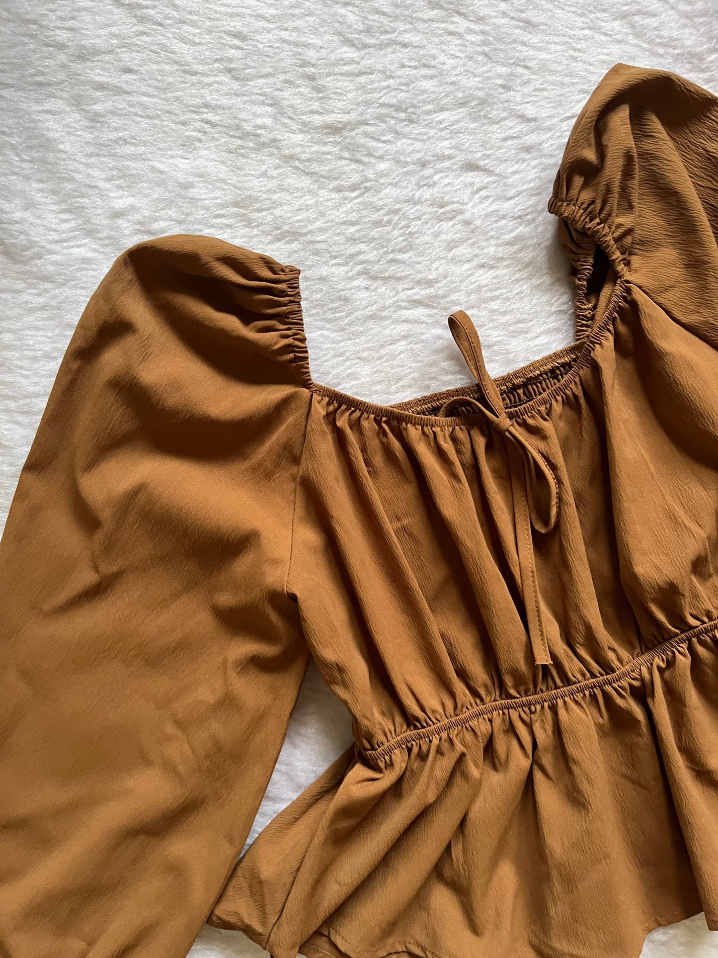 Brown ruffle top